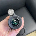Starscope person holding product on camera